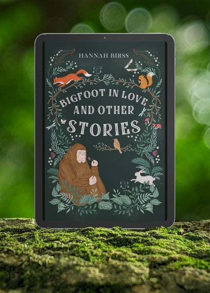 Book cover of "Bigfoot in Love and Other Stories" by Hannah Birss displayed on a tablet on a bed of moss in a forest.